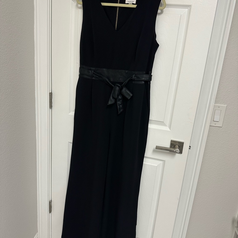 Calvin Klein Black Garment with Gold Zipper